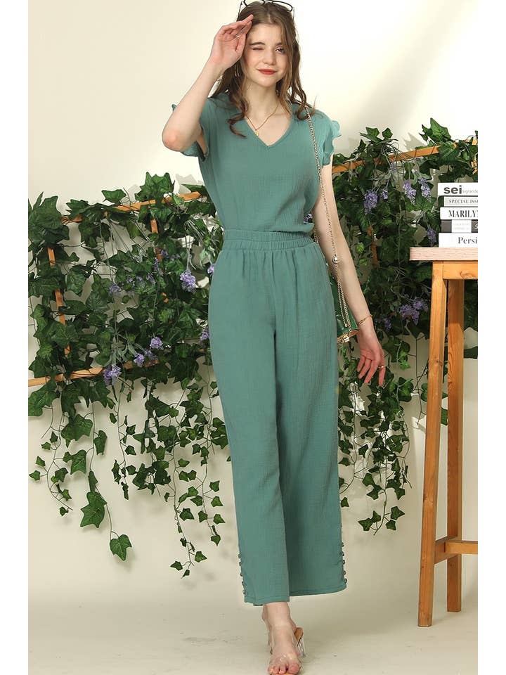 BANDED SMOCKING LONG PANTS WITH BUTTON DETAILED