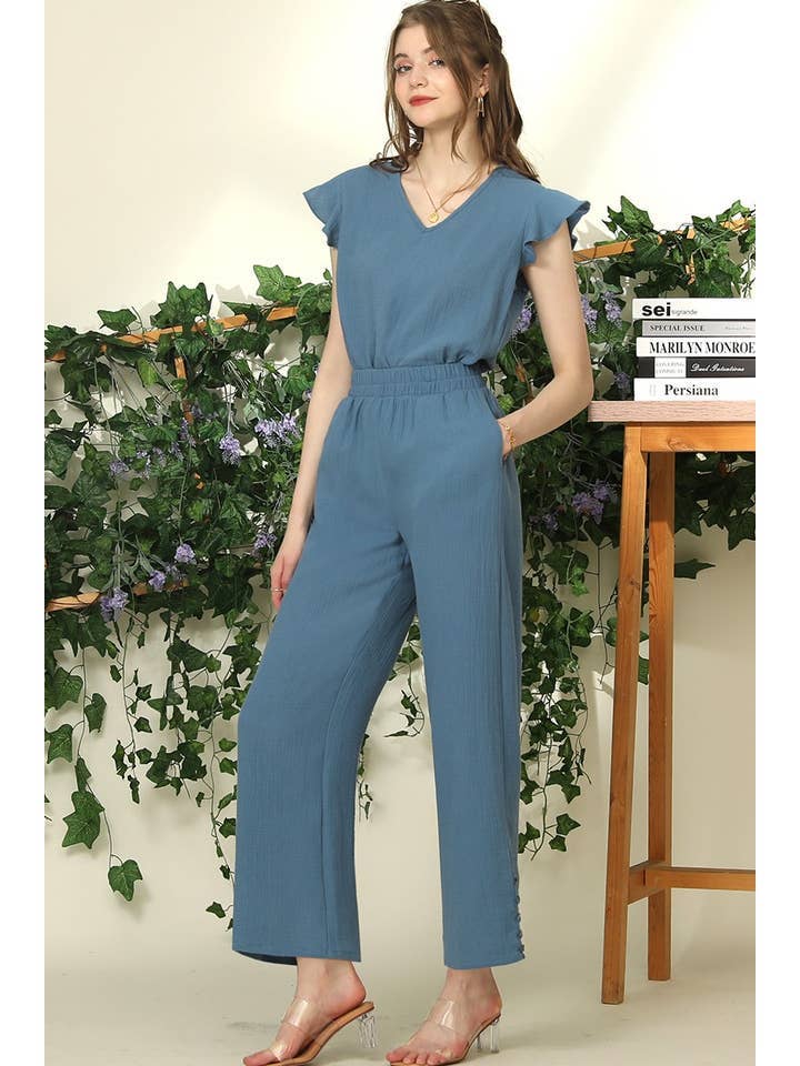 BANDED SMOCKING LONG PANTS WITH BUTTON DETAILED