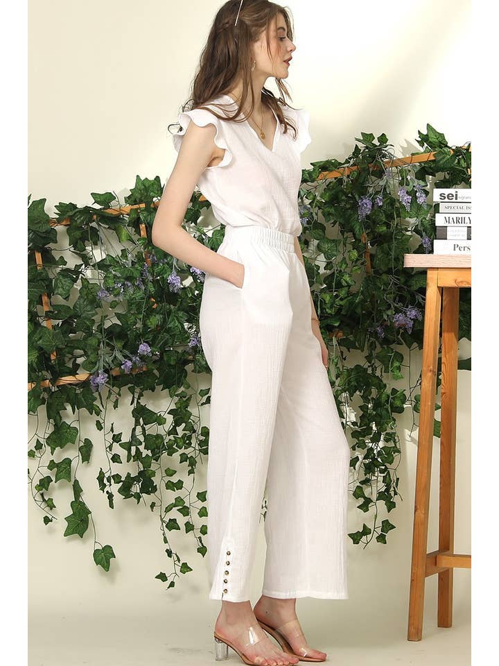 BANDED SMOCKING LONG PANTS WITH BUTTON DETAILED
