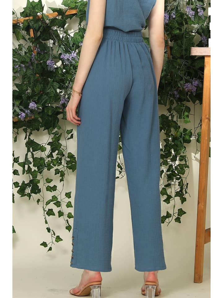 BANDED SMOCKING LONG PANTS WITH BUTTON DETAILED