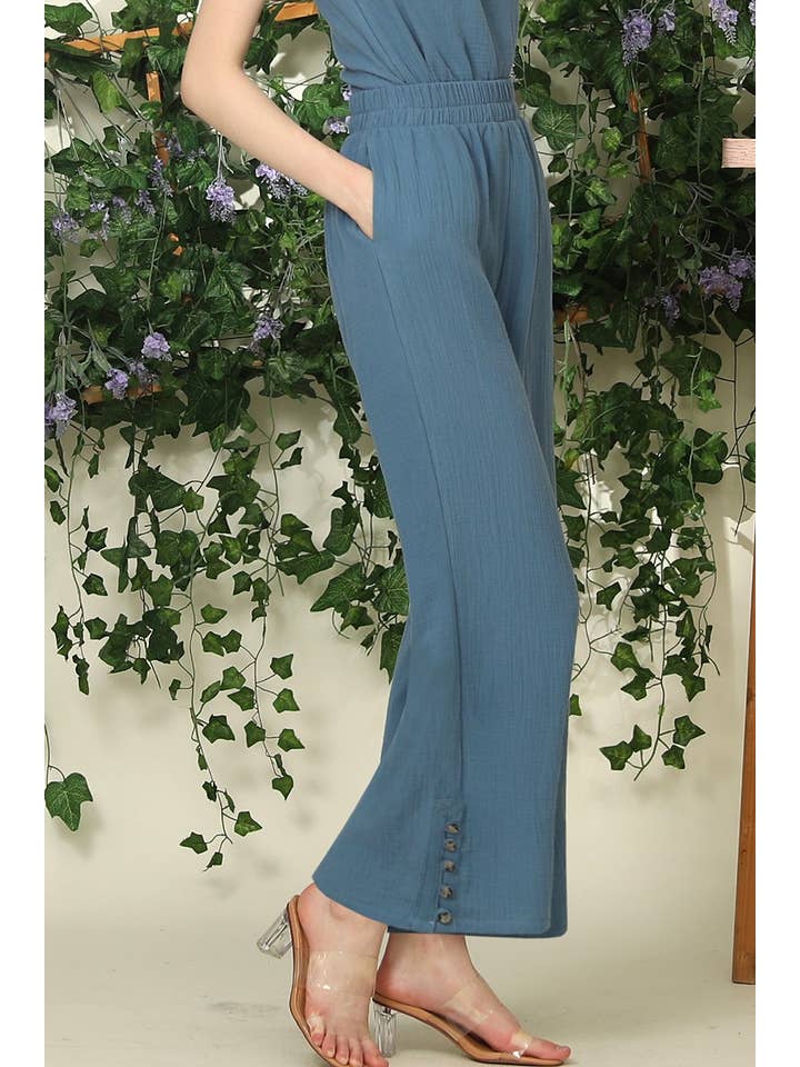 BANDED SMOCKING LONG PANTS WITH BUTTON DETAILED
